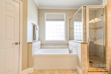 Welcome to 128 Harbourtown Drive - Woodbridge Subdivision. This on Woodbridge Golf Links in North Carolina - for sale on GolfHomes.com, golf home, golf lot