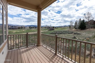 This exceptional and spacious home sits on the 11th tee of the on Eagle Ranch in Colorado - for sale on GolfHomes.com, golf home, golf lot