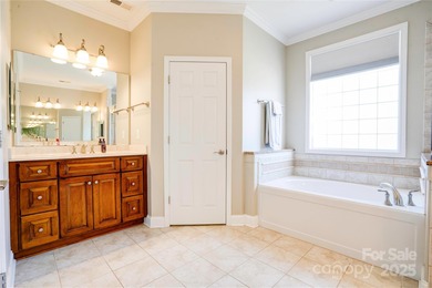 Welcome to 128 Harbourtown Drive - Woodbridge Subdivision. This on Woodbridge Golf Links in North Carolina - for sale on GolfHomes.com, golf home, golf lot