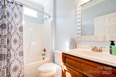 Welcome to 128 Harbourtown Drive - Woodbridge Subdivision. This on Woodbridge Golf Links in North Carolina - for sale on GolfHomes.com, golf home, golf lot