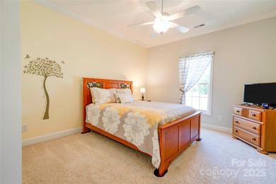 Welcome to 128 Harbourtown Drive - Woodbridge Subdivision. This on Woodbridge Golf Links in North Carolina - for sale on GolfHomes.com, golf home, golf lot