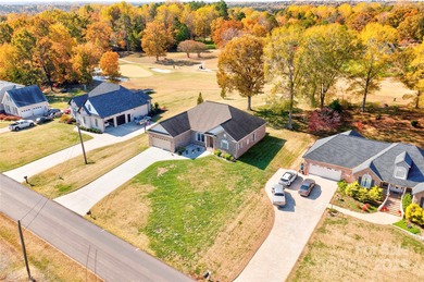 Welcome to 128 Harbourtown Drive - Woodbridge Subdivision. This on Woodbridge Golf Links in North Carolina - for sale on GolfHomes.com, golf home, golf lot