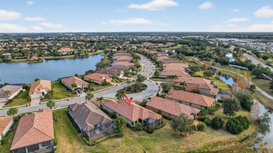 Experience elevated Florida living in this elegantly upgraded on Esplanade Golf and Country at Lakewood Ranch in Florida - for sale on GolfHomes.com, golf home, golf lot