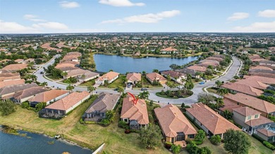 Experience elevated Florida living in this elegantly upgraded on Esplanade Golf and Country at Lakewood Ranch in Florida - for sale on GolfHomes.com, golf home, golf lot