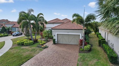 Experience elevated Florida living in this elegantly upgraded on Esplanade Golf and Country at Lakewood Ranch in Florida - for sale on GolfHomes.com, golf home, golf lot