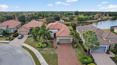 Experience elevated Florida living in this elegantly upgraded on Esplanade Golf and Country at Lakewood Ranch in Florida - for sale on GolfHomes.com, golf home, golf lot