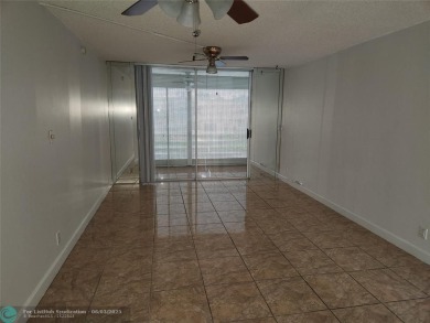 55+ COMMUNITY, UNIT IS ON THE 2nd FLOOR, WELL KEPT BUILDING #120 on Sunrise Lakes Phase III in Florida - for sale on GolfHomes.com, golf home, golf lot