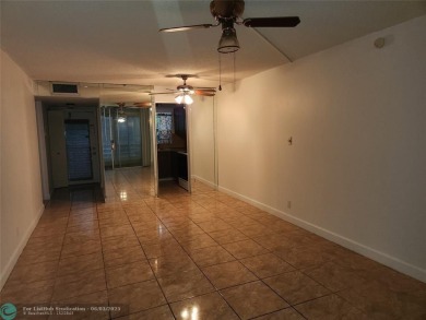 55+ COMMUNITY, UNIT IS ON THE 2nd FLOOR, WELL KEPT BUILDING #120 on Sunrise Lakes Phase III in Florida - for sale on GolfHomes.com, golf home, golf lot