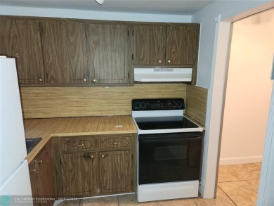 55+ COMMUNITY, UNIT IS ON THE 2nd FLOOR, WELL KEPT BUILDING #120 on Sunrise Lakes Phase III in Florida - for sale on GolfHomes.com, golf home, golf lot