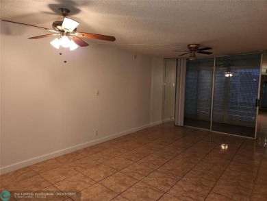 55+ COMMUNITY, UNIT IS ON THE 2nd FLOOR, WELL KEPT BUILDING #120 on Sunrise Lakes Phase III in Florida - for sale on GolfHomes.com, golf home, golf lot