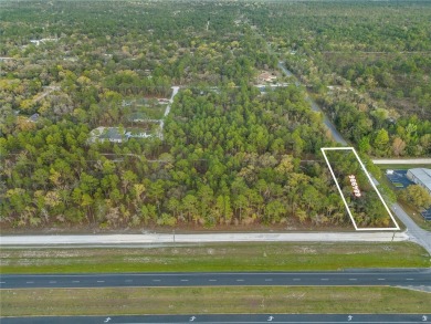 Prime C-2 commercial lot located in the rapidly growing Hernando on Dunes Golf Club in Florida - for sale on GolfHomes.com, golf home, golf lot