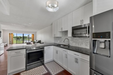 Wake up to tranquil lake and golf course views in this on Fountains Golf and Country Club in Florida - for sale on GolfHomes.com, golf home, golf lot