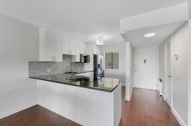 Wake up to tranquil lake and golf course views in this on Fountains Golf and Country Club in Florida - for sale on GolfHomes.com, golf home, golf lot