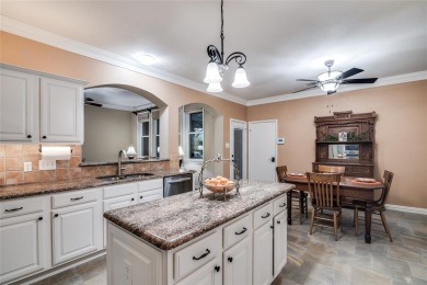 STUNNING home with 4 bedroom, 2.5 bath, 3 living areas in on Firewheel Golf Park in Texas - for sale on GolfHomes.com, golf home, golf lot