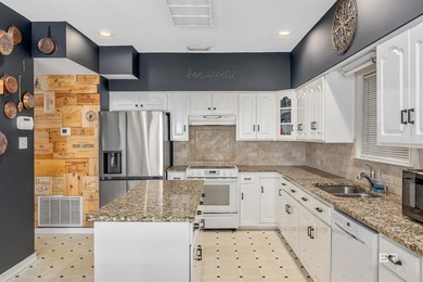 2,444 square feet with a fortified roof (2022) and new HVAC at on Lake Forest Yacht and Country Club in Alabama - for sale on GolfHomes.com, golf home, golf lot