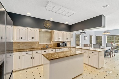 2,444 square feet with a fortified roof (2022) and new HVAC at on Lake Forest Yacht and Country Club in Alabama - for sale on GolfHomes.com, golf home, golf lot