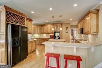 Nestled in the heart of the prestigious gated community of on Laurel Springs Golf Club in Georgia - for sale on GolfHomes.com, golf home, golf lot
