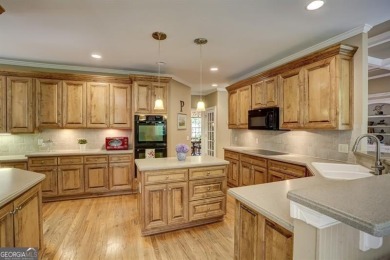 Nestled in the heart of the prestigious gated community of on Laurel Springs Golf Club in Georgia - for sale on GolfHomes.com, golf home, golf lot