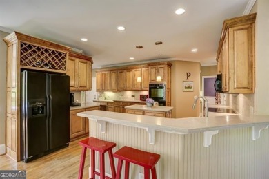 Nestled in the heart of the prestigious gated community of on Laurel Springs Golf Club in Georgia - for sale on GolfHomes.com, golf home, golf lot