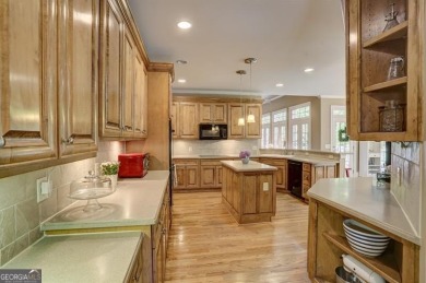 Nestled in the heart of the prestigious gated community of on Laurel Springs Golf Club in Georgia - for sale on GolfHomes.com, golf home, golf lot