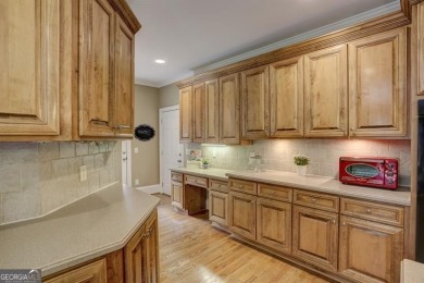 Nestled in the heart of the prestigious gated community of on Laurel Springs Golf Club in Georgia - for sale on GolfHomes.com, golf home, golf lot
