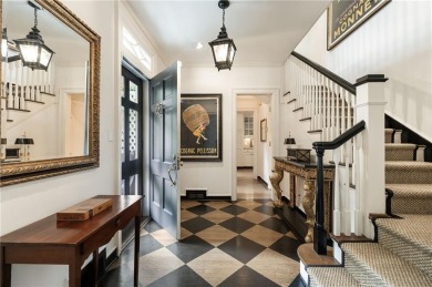 Tucked in the heart of Haynes Manor, this timeless traditional on Bobby Jones Golf Club in Georgia - for sale on GolfHomes.com, golf home, golf lot
