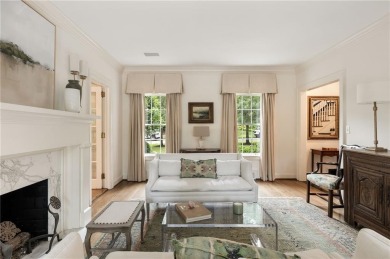 Tucked in the heart of Haynes Manor, this timeless traditional on Bobby Jones Golf Club in Georgia - for sale on GolfHomes.com, golf home, golf lot