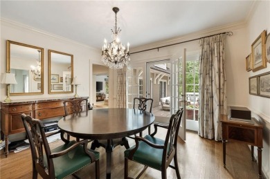 Tucked in the heart of Haynes Manor, this timeless traditional on Bobby Jones Golf Club in Georgia - for sale on GolfHomes.com, golf home, golf lot