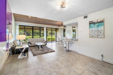 Discover resort-style living at its finest in this rarely on PGA National Golf Club in Florida - for sale on GolfHomes.com, golf home, golf lot