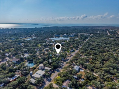 Tucked beneath a canopy of majestic coastal live oaks in the on Lamar Golf Course in Texas - for sale on GolfHomes.com, golf home, golf lot