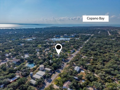 Tucked beneath a canopy of majestic coastal live oaks in the on Lamar Golf Course in Texas - for sale on GolfHomes.com, golf home, golf lot