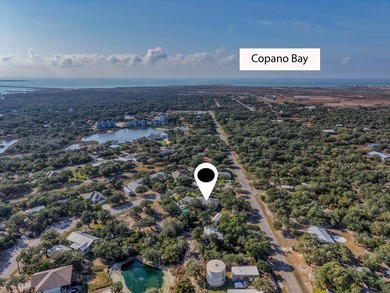 Tucked beneath a canopy of majestic coastal live oaks in the on Lamar Golf Course in Texas - for sale on GolfHomes.com, golf home, golf lot