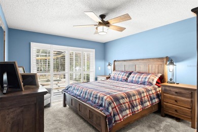 Welcome to an exceptional four-bedroom, two-and-a-half-bath pool on East Lake Woodlands Country Club in Florida - for sale on GolfHomes.com, golf home, golf lot