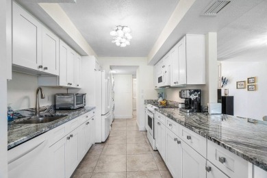 Discover resort-style living at its finest in this rarely on PGA National Golf Club in Florida - for sale on GolfHomes.com, golf home, golf lot