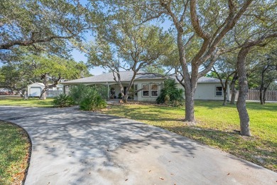 Tucked beneath a canopy of majestic coastal live oaks in the on Lamar Golf Course in Texas - for sale on GolfHomes.com, golf home, golf lot