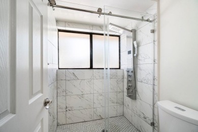 Discover resort-style living at its finest in this rarely on PGA National Golf Club in Florida - for sale on GolfHomes.com, golf home, golf lot