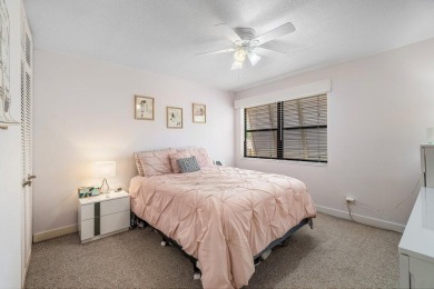 Discover resort-style living at its finest in this rarely on PGA National Golf Club in Florida - for sale on GolfHomes.com, golf home, golf lot