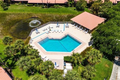 Discover resort-style living at its finest in this rarely on PGA National Golf Club in Florida - for sale on GolfHomes.com, golf home, golf lot