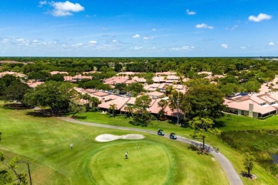 Discover resort-style living at its finest in this rarely on PGA National Golf Club in Florida - for sale on GolfHomes.com, golf home, golf lot