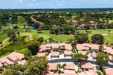 Discover resort-style living at its finest in this rarely on PGA National Golf Club in Florida - for sale on GolfHomes.com, golf home, golf lot