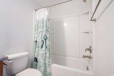 This impeccably designed 4-bedroom, 3.5-bath Mediterranean-style on Barefoot Resort and Golf Club  in South Carolina - for sale on GolfHomes.com, golf home, golf lot