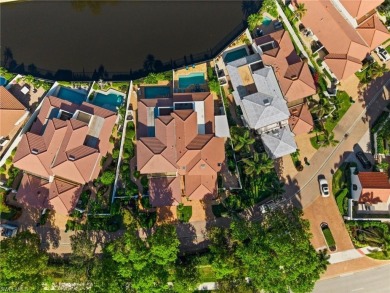 Experience the epitome of Pelican Bay living in this on Club at Pelican Bay Golf Course in Florida - for sale on GolfHomes.com, golf home, golf lot