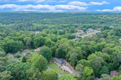 This hard-to-find Ranch-style home with a full finished basement on Collins Hill Golf Club in Georgia - for sale on GolfHomes.com, golf home, golf lot