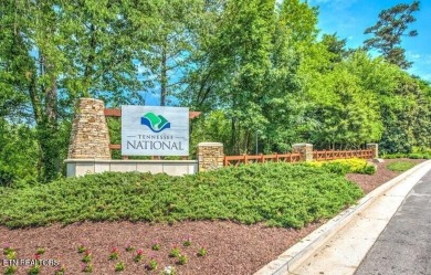 This lot is located in an Elite Waterfront Golf Community on Tennessee National Golf Club in Tennessee - for sale on GolfHomes.com, golf home, golf lot