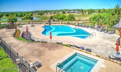 This lot is located in an Elite Waterfront Golf Community on Tennessee National Golf Club in Tennessee - for sale on GolfHomes.com, golf home, golf lot