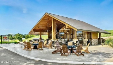This lot is located in an Elite Waterfront Golf Community on Tennessee National Golf Club in Tennessee - for sale on GolfHomes.com, golf home, golf lot
