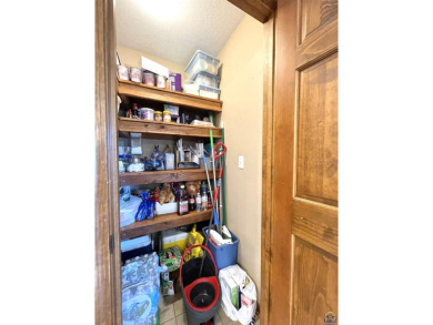 Incredible home nestled in the lake Ridge Subdivision and golf on Lake Perry Country Club in Kansas - for sale on GolfHomes.com, golf home, golf lot