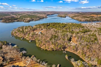 Located in the prestigious gated community of Heron Bay, this on Old North State Club at Uwharrie Point Golf community in North Carolina - for sale on GolfHomes.com, golf home, golf lot