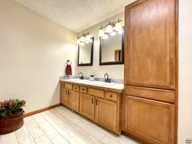 Incredible home nestled in the lake Ridge Subdivision and golf on Lake Perry Country Club in Kansas - for sale on GolfHomes.com, golf home, golf lot