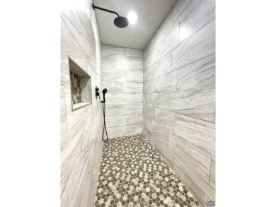 Incredible home nestled in the lake Ridge Subdivision and golf on Lake Perry Country Club in Kansas - for sale on GolfHomes.com, golf home, golf lot